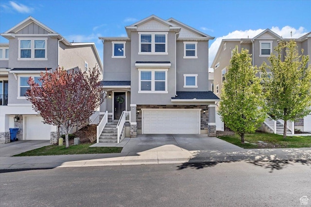 4941 W Chrome Rd, Herriman, UT 84096 - multi unit property featuring stone siding, concrete driveway, stucco siding, and a garage