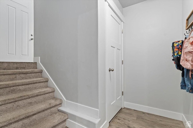 4941 W Chrome Rd, Herriman, UT 84096 - stairway with baseboards and wood finished floors