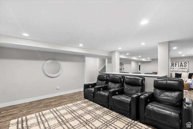 cinema with baseboards, wood finished floors, and recessed lighting