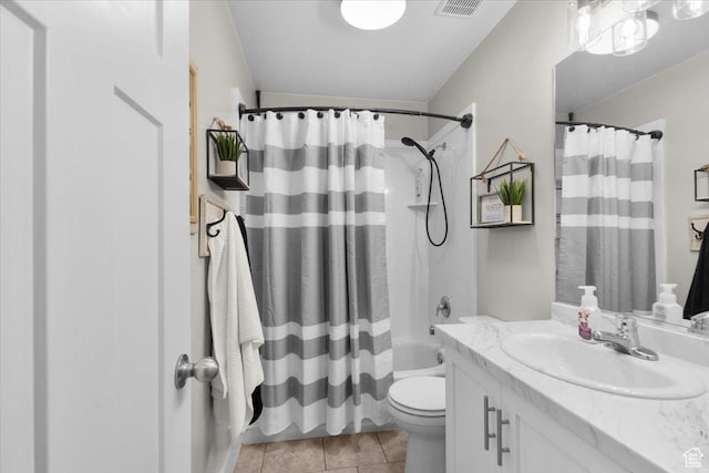 bathroom featuring tile patterned floors, vanity, shower / tub combo with curtain, toilet, and visible vents