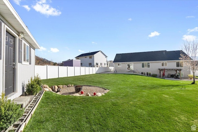 view of yard with fence