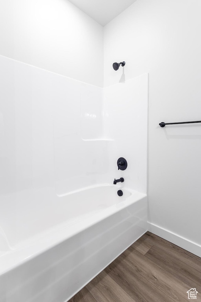 3080 N 2875 W Unit 25, Plain City, UT 84404 - full bath featuring wood finished floors, baseboards, and bathing tub / shower combination