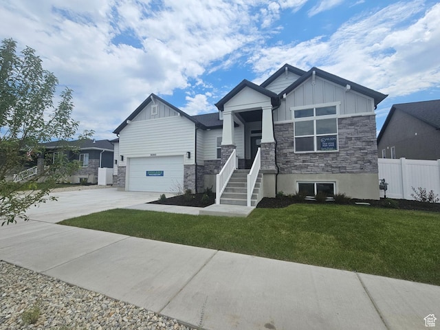 3080 N 2875 W Unit 25, Plain City, UT 84404 - craftsman-style home with board and batten siding, stone siding, driveway, and an attached garage
