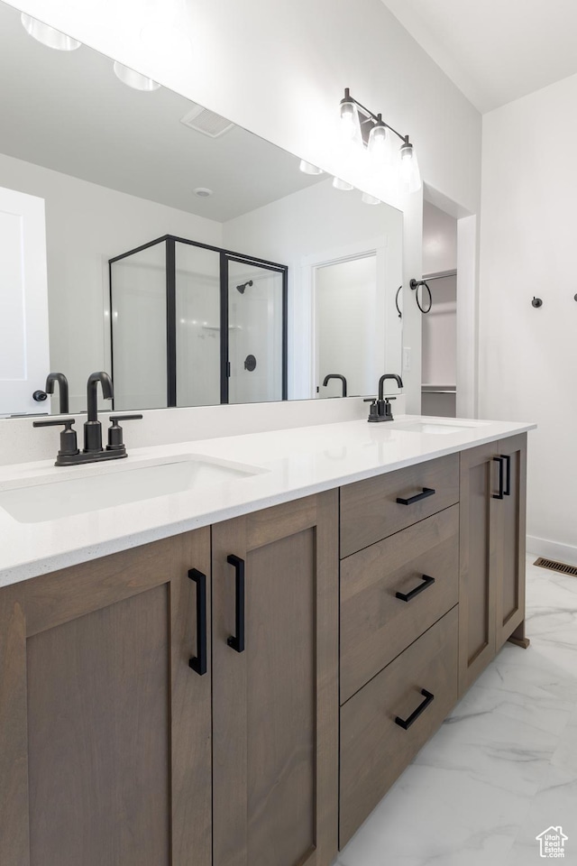 3080 N 2875 W Unit 25, Plain City, UT 84404 - full bath with a sink, a stall shower, marble finish floor, double vanity, and visible vents