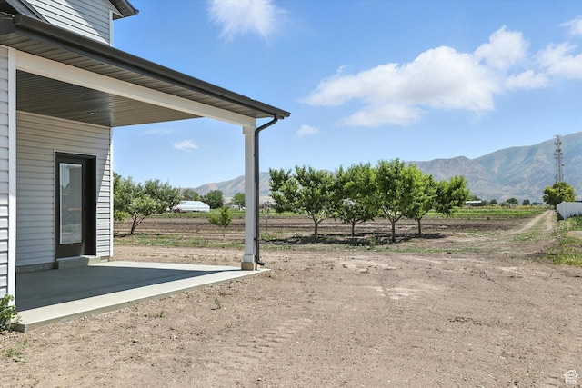 1273 S 240 W Lot 9, Tremonton, UT 84337 - view of yard featuring a mountain view and a view of rural / pastoral area