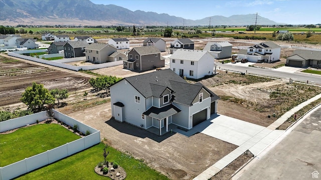 1273 S 240 W Lot 9, Tremonton, UT 84337 - aerial view of residential area with a mountain backdrop