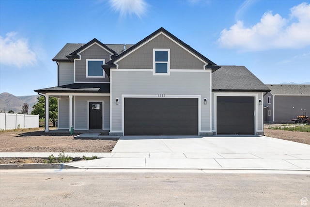 1273 S 240 W Lot 9, Tremonton, UT 84337 - craftsman inspired home featuring concrete driveway, a porch, and a garage