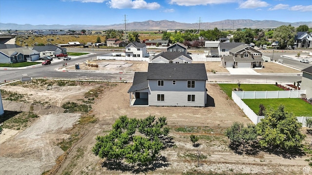 1273 S 240 W Lot 9, Tremonton, UT 84337 - aerial view of residential area with a mountain backdrop