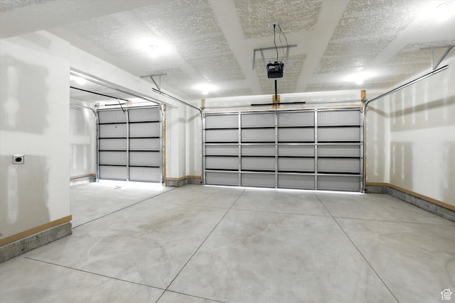1273 S 240 W Lot 9, Tremonton, UT 84337 - garage with baseboards and a garage door opener