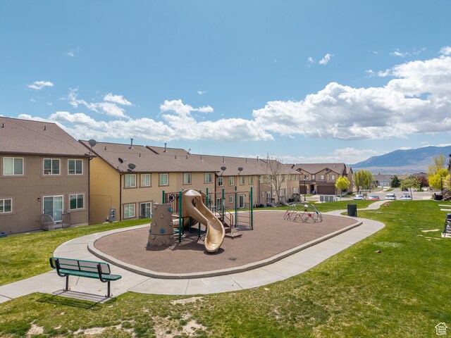 2046 N Belmont Dr, Saratoga Springs, UT 84045 - community jungle gym with a lawn, a mountain view, and a residential view