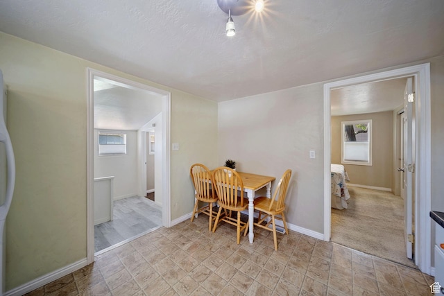 730 E 3155 S, Millcreek, UT 84106 - dining room with baseboards and stone finish floor