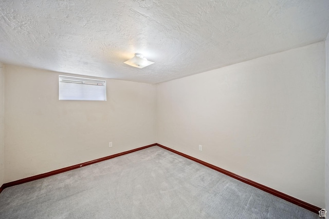 730 E 3155 S, Millcreek, UT 84106 - spare room with baseboards, carpet flooring, and a textured ceiling