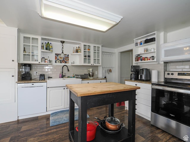 kitchen with white cabinets, open shelves, white appliances, dark wood-type flooring, and decorative backsplash