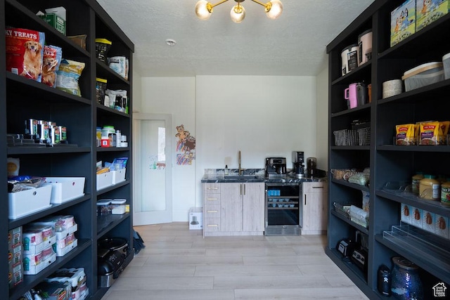 14661 S Rock Canyon Cir W, Herriman, UT 84096 - storage area with wine cooler and a sink
