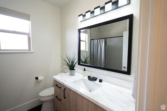 14661 S Rock Canyon Cir W, Herriman, UT 84096 - bathroom with vanity, toilet, and baseboards