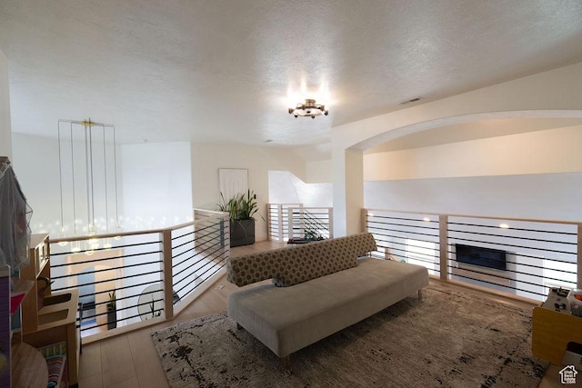 14661 S Rock Canyon Cir W, Herriman, UT 84096 - living area with a textured ceiling and wood finished floors