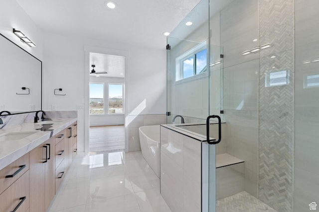 3010 W Willow Dr S, Lehi, UT 84043 - bathroom featuring plenty of natural light, recessed lighting, a freestanding tub, and a stall shower