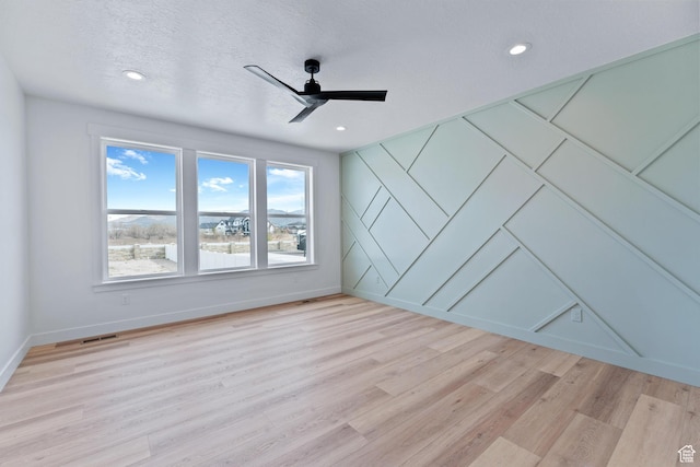 3010 W Willow Dr S, Lehi, UT 84043 - empty room featuring ceiling fan, light wood-style flooring, recessed lighting, baseboards, and visible vents