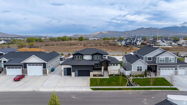 3010 W Willow Dr S, Lehi, UT 84043 - view of front of property featuring a mountain view, concrete driveway, and stone siding