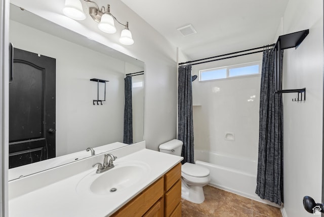 bathroom with shower / bath combo, toilet, vanity, and visible vents
