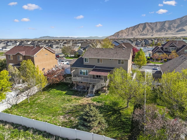 aerial view with a mountain view and a residential view