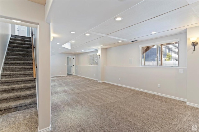 basement with baseboards, carpet floors, recessed lighting, and stairway