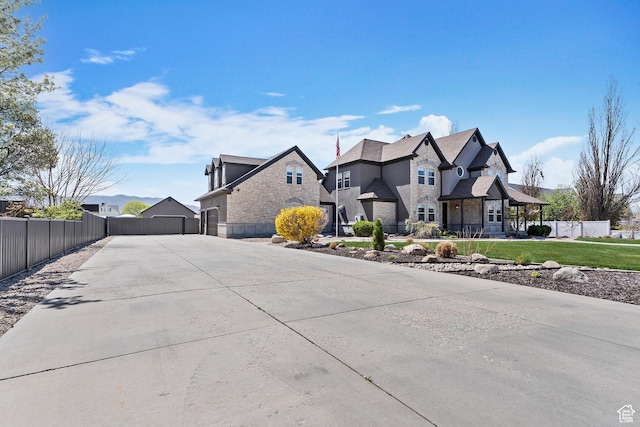 468 E 12000 S, Draper, UT 84020 - exterior space with a yard, driveway, stone siding, and fence