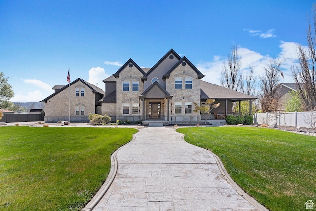 468 E 12000 S, Draper, UT 84020 - view of front facade with stone siding, fence, and a front yard