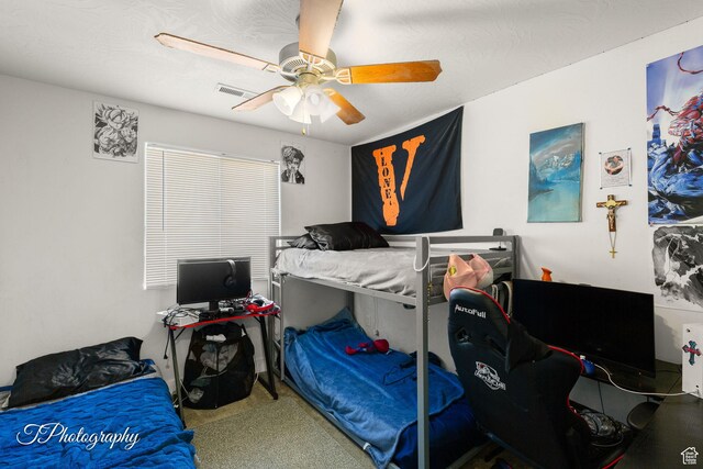 2261 S Tonaquint Dr W Unit 55, St George, UT 84770 - carpeted bedroom featuring ceiling fan and visible vents