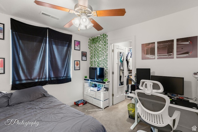 2261 S Tonaquint Dr W Unit 55, St George, UT 84770 - carpeted bedroom with visible vents, baseboards, and ceiling fan