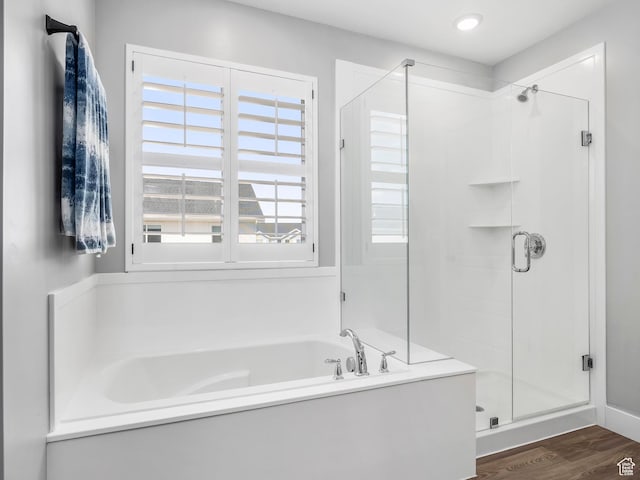 1058 S 800 W, American Fork, UT 84003 - bathroom with a shower stall, a garden tub, wood finished floors, and recessed lighting