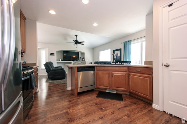 3611 W 850 S, Syracuse, UT 84075 - kitchen with a sink, open floor plan, ceiling fan, stainless steel appliances, and dark wood finished floors