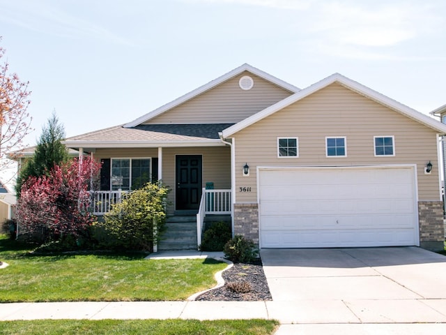 ranch-style home featuring a garage, driveway, a porch, and a front yard