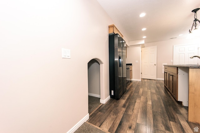 3611 W 850 S, Syracuse, UT 84075 - kitchen featuring recessed lighting, stainless steel fridge with ice dispenser, arched walkways, dark wood-type flooring, and baseboards