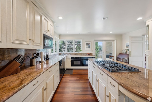 1500 E Arlington Dr, Salt Lake City, UT 84103 - kitchen with light stone counters, tasteful backsplash, black appliances, ornamental molding, and dark wood-style floors