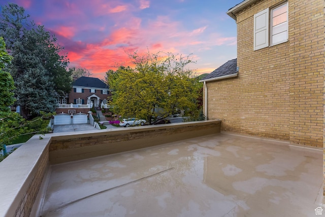 1500 E Arlington Dr, Salt Lake City, UT 84103 - patio terrace at dusk with a balcony