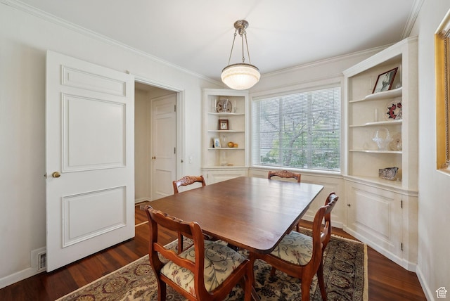 1500 E Arlington Dr, Salt Lake City, UT 84103 - dining space featuring visible vents, dark wood-type flooring, ornamental molding, and built in shelves