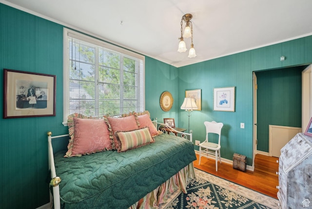 1500 E Arlington Dr, Salt Lake City, UT 84103 - bedroom featuring baseboards, ornamental molding, and wood finished floors