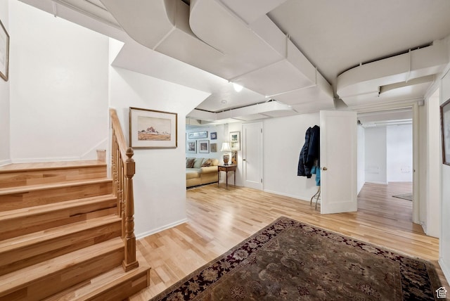 1500 E Arlington Dr, Salt Lake City, UT 84103 - entrance foyer with stairway, baseboards, and light wood-style floors