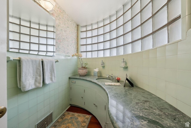 1500 E Arlington Dr, Salt Lake City, UT 84103 - bathroom featuring tile walls, visible vents, and vanity