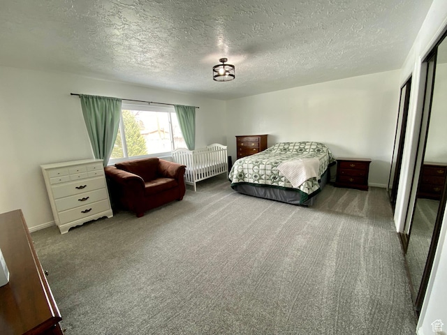 155 W 350 S, Glenwood, UT 84730 - carpeted bedroom with a closet, a textured ceiling, and baseboards