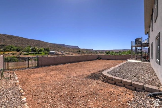 715 S Peachtree Dr, Toquerville, UT 84774 - view of yard with a fenced backyard and a mountain view