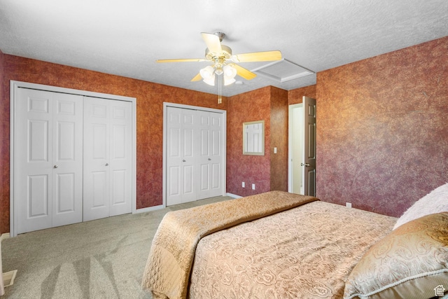 6160 S 1350 E, South Ogden, UT 84405 - carpeted bedroom with ceiling fan and multiple closets