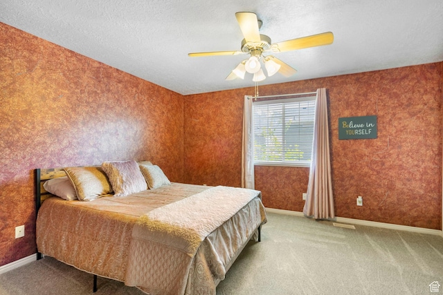 6160 S 1350 E, South Ogden, UT 84405 - bedroom with baseboards, a ceiling fan, a textured ceiling, and carpet flooring