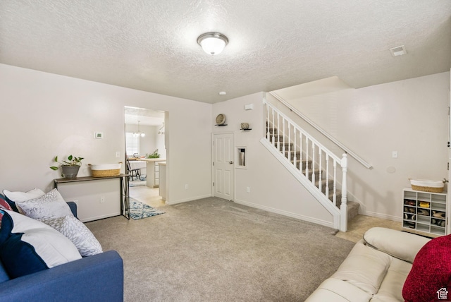 6160 S 1350 E, South Ogden, UT 84405 - carpeted living area featuring a chandelier, stairway, a textured ceiling, and baseboards