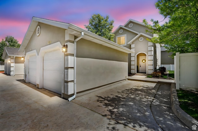 6160 S 1350 E, South Ogden, UT 84405 - view of front of property featuring a garage and stucco siding