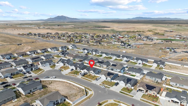 aerial view featuring a residential view and a mountain view