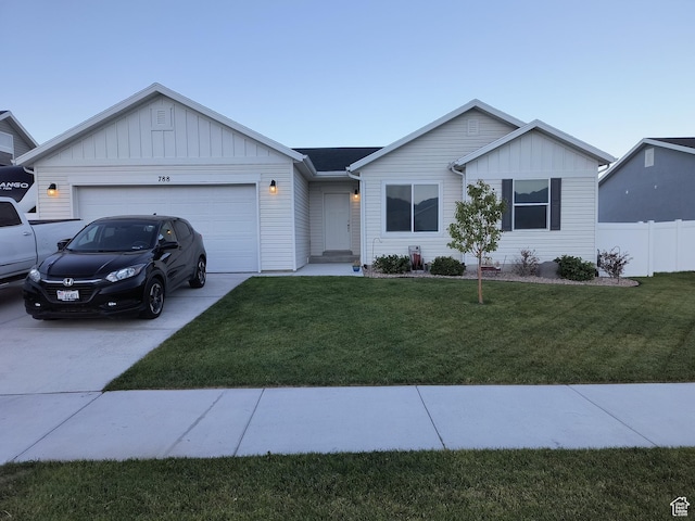 single story home with a front lawn, driveway, board and batten siding, fence, and a garage