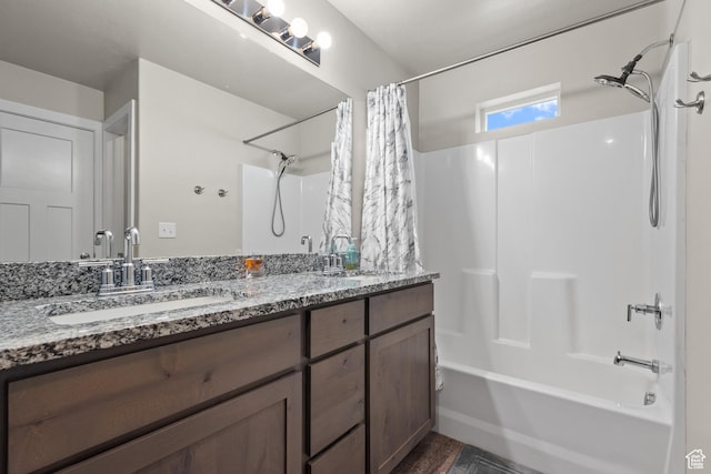 full bathroom with double vanity, shower / tub combo, wood finished floors, and a sink