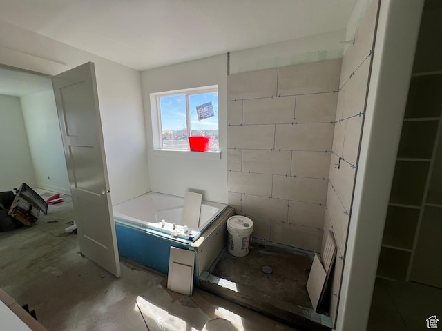 1155 E 1150 S, Garland, UT 84312 - bathroom featuring a garden tub and toilet